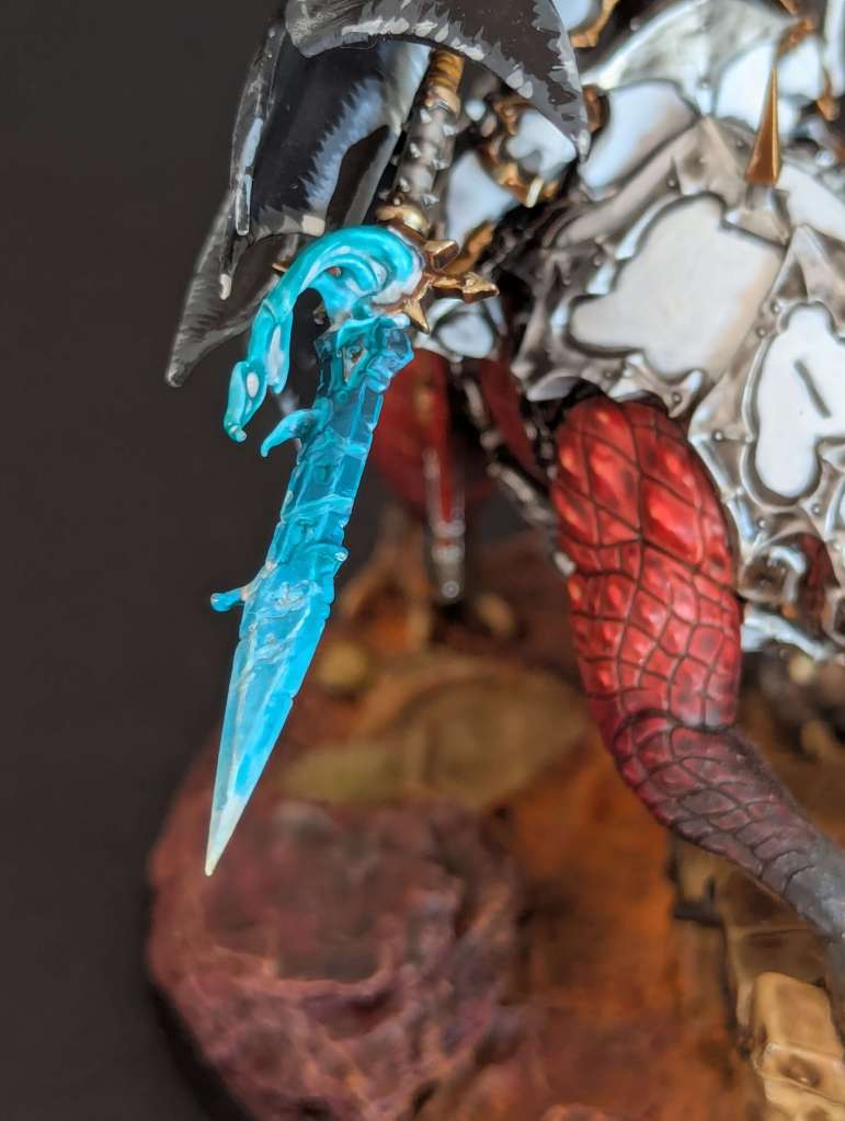 Abraxia, Lance de l'Élu Éternel